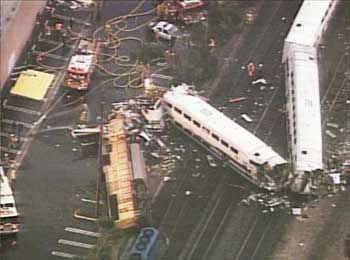 Aerial view of crash site of Los Angeles commuter trains collision outside Glendale, California, January 26, 2005. Ten people were killed and about 200 injured on Wednesday when two Los Angeles commuter trains collided after one of them hit a vehicle left on the tracks by a man contemplating suicide, authorities said. Police and city officials said the 26-year-old man, whom they described as "deranged," watched the two trains smash into each other at high speed after leaving his Jeep Cherokee on the tracks.