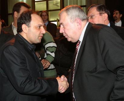 Russia's Federal Atomic Energy Agency head Alexander Rumyantsev, right, shakes hands with Vice-President of the Atomic Energy Organization of Iran (news - web sites), Mohammad Saeedi, at Mehrabad airport in Tehran Friday Feb. 25, 2005. Rumyantsev, arrived in Tehran to sign a key deal to supply Iran with enriched fuel for its first nuclear reactor on condition that the spent fuel is returned. (AP Photo/STR) 
