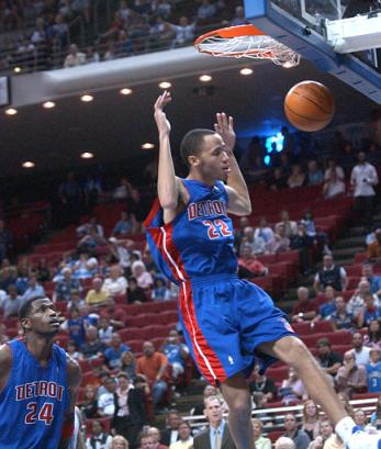 Detroit Pistons' Tayshaun Prince scores as teammate Antonio McDyess, left, watches late in the fourth quarter against the Orlando Magic in Orlando, Fla., Friday, April 8, 2005. Detroit won 114-102. (Photo/Peter Cosgrove) 