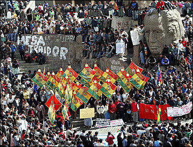 Hundreds of Bolivian natives take part in a popular open meeting at the San Francisco plaza in La Paz, demanding nationalization of Bolivia's natural gas wealth and a Constituent Assembly. Bolivian lawmakers indefinitely postponed an emergency session of Congress to discuss President Carlos Mesa's resignation offer after soldiers shot dead a protester and miners battled police in downtown Sucre.(AFP