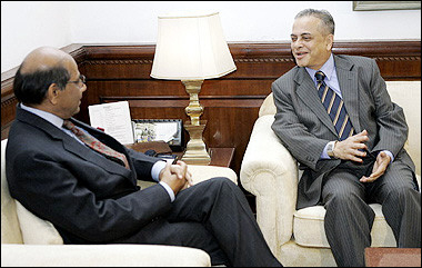 Indian Foreign Secretary Shyam Saran (L) listens to his Bangladeshi counterpart Mohammad Hemayetuddin speak during a meeting in New Delhi. India and Bangladesh agreed to several measures aimed at easing tensions along their border, which is the scene of frequent bloody clashes between security forces from the two countries, officials said.(AFP