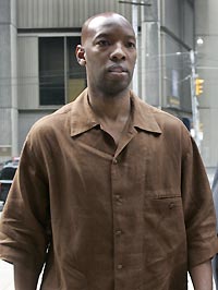 Sam Cassell of the National Basketball Association Minnesota Timberwolves arrives for a court appearance to face two counts of simple assault charges in Toronto, July 5, 2005. 