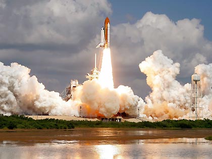 Shuttle Discovery blasts into orbit