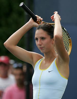 Anastasia Myskina of Russia pauses during play against Tamarine Tanasugarn of Thailand during their match at the U.S. Open tennis tournament in Flushing Meadows, New York, August 30, 2005. Myskina defeated Tanasugarn 6-3 6-1.