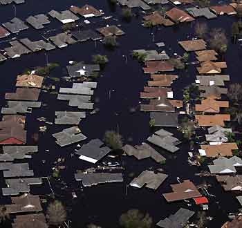 An entire neighborhood is submerged in New Orleans, Louisiana after Hurricane Katrina struck August 31, 2005. Authorities struggled on Wednesday to evacuate thousands of people from hurricane-battered New Orleans as food and water grew scarce and looters raided stores, while U.S. President George W. Bush said it would take years to recover from the devastation.