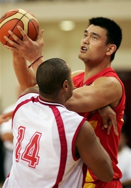 NBA center Yao Ming from the Houston Rockets collected 24 points, 14 rebounds and 7 blocks to power the way for China to claim its 14th Asian championship since 1975.