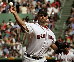 Boston Red Sox starting pitcher Tim Wakefield delivers a throw during the fifth inning against the Toronto Blue Jays at Fenway Park in Boston, Tuesday afternoon Sept. 27, 2005.