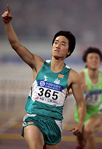 Olympic gold medallist Liu Xiang reacts after winning the 110m hurdles last night at the 10th National Games in Nanjing