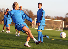 David Beckham is hit by a football during a training session at Carrington training complex in Manchester November 9, 2005. 