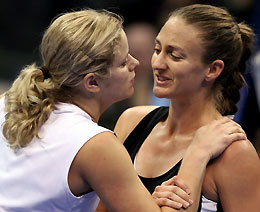 Clijsters of Belgium (L) congratulates Mary Pierce of France during the WTA Tour Championships in Los Angeles November 8, 2005.