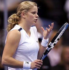 Clijsters of Belgium reacts during her 6-1 4-6 7-6(2) loss to Mary Pierce of France during the WTA Tour Championships in Los Angeles November 8, 2005.