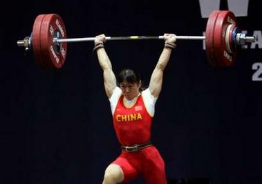 Gu Wei lifts during the women's 58kg category in the World Weightlifting Championships in Doha November 11, 2005.