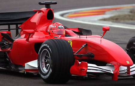 Germany's Michael Schumacher tests the new Ferrari Formula One race car on the company's track in the Italian town of Fiorano January 16, 2006. Schumacher gave Ferrari's new Formula One car its first outing when he drove it around the team's test circuit at Fiorano on Monday. [Reuters]