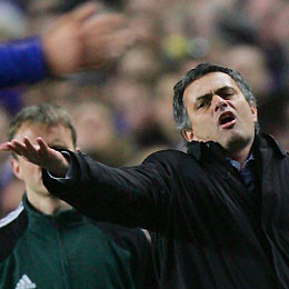Chelsea抯 manager Jose Mourinho reacts during play against Barcelona during their Champions League first knockout round first leg soccer match at Stamford Bridge in London February 22, 2006. 