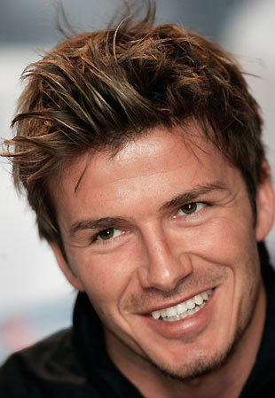 England's captain David Beckham speaks during a news conference at Anfiled in Liverpool, northern England February 28, 2006. England will play Uruguay in an international friendly soccer match at Anfield on Wednesday. [Reuters]