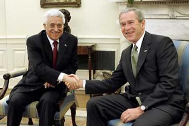 Bush embraces Abbas as courageous reformer