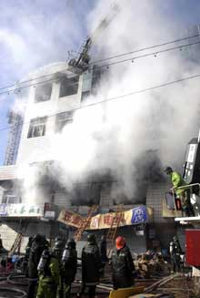 Two fires in China kill 92, injure 71