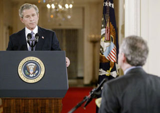 Bush stands firm on transfer of power in Iraq