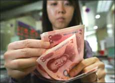 Governor: Yuan peg reform 'a slow business'