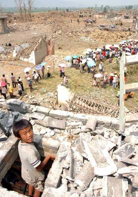 Blast kills 11 in Yunan village