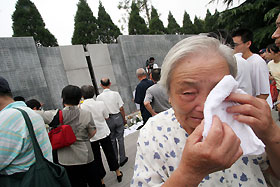 Sirens mark anniversary of Japan invasion