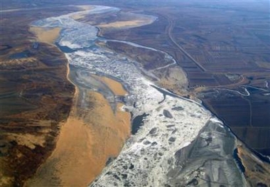 Experts begin testing cross-border river