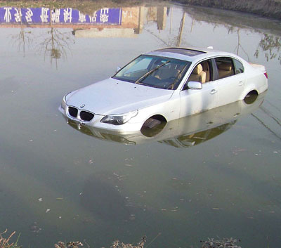 BMW in the pond