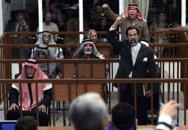 Court reverses ruling in Saddam trial