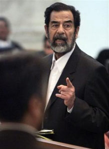 Saddam claims he was 'beaten by Americans'