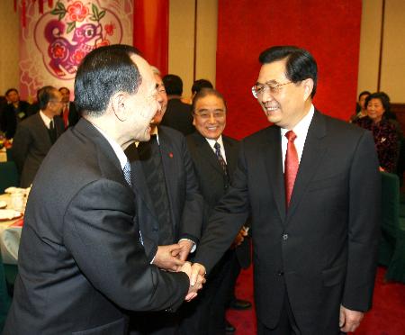 President Hu calls for peaceful reunification
