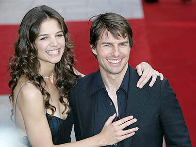 Tom Cruise gives MP3 player to Holmes