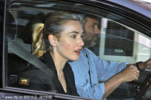 Kate Winslet and Sam Mendes step out again without rings for kids