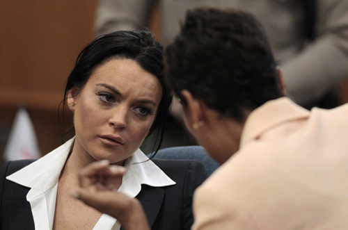 Lohan fitted with alcohol monitoring device