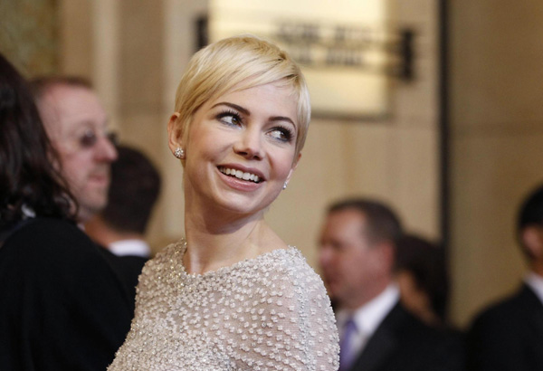 Best actress nominee Michelle Williams walks the red carpet at the 83rd Academy Awards