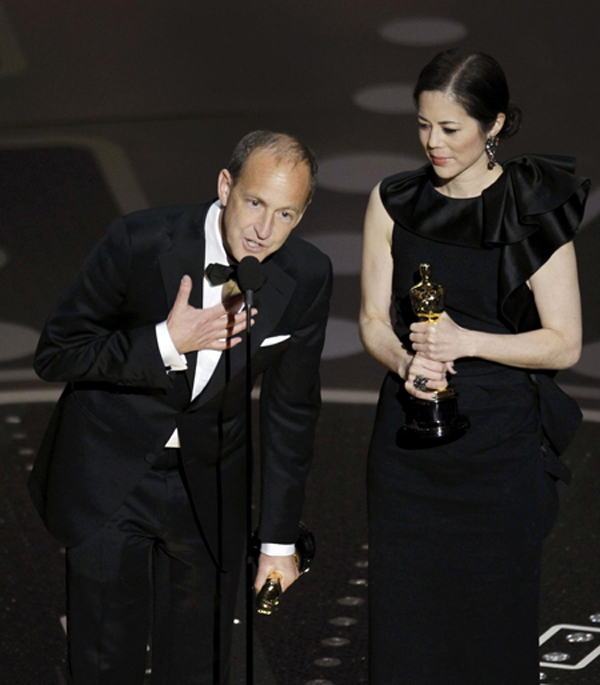 Charles Ferguson and Audrey Marrs win the Oscar for best documentary feature