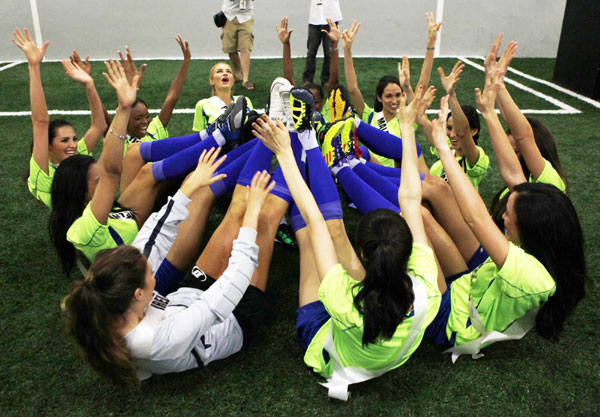 Miss Universe 2011 contestants play football in Sao Paulo