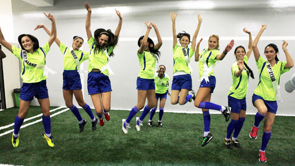 Miss Universe 2011 contestants play football in Sao Paulo