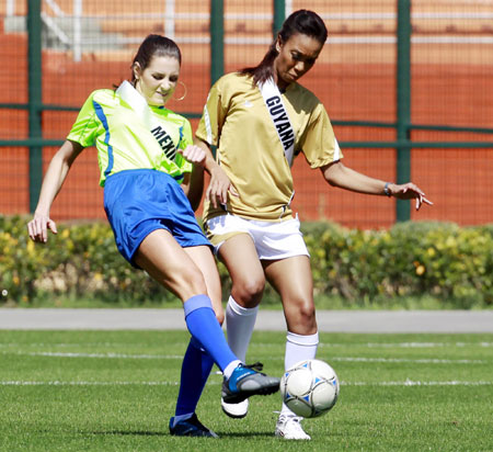 Miss Universe 2011 contestants play football in Sao Paulo