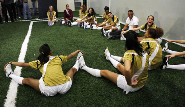 Miss Universe 2011 contestants play football in Sao Paulo