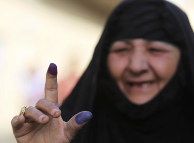 伊拉克国民议会选举开始 迫击炮弹、炸弹袭击不断