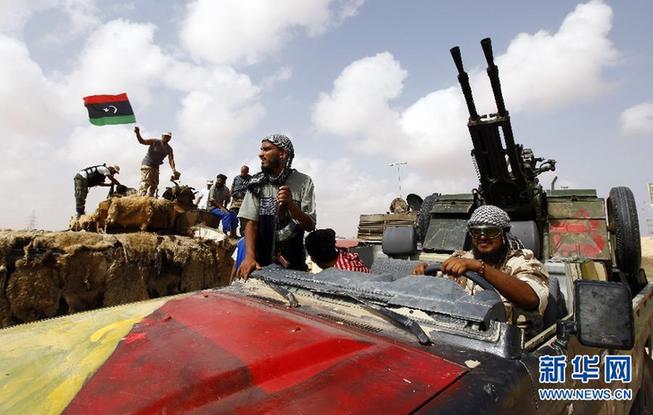 利比亚在联合国换旗 卡扎菲否认政权被推翻