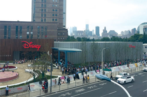 Crowds flock to world's largest Disney store