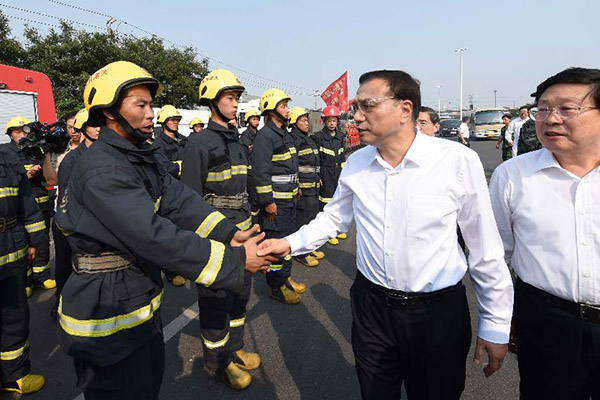 Premier Li in Tianjin to coordinate rescue work, post-blast resettlement