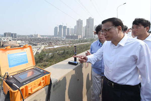 Premier Li in Tianjin to coordinate rescue work, post-blast resettlement