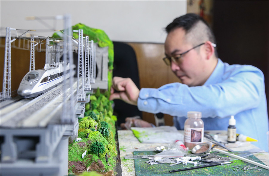 Railway conductor builds lifelike train models