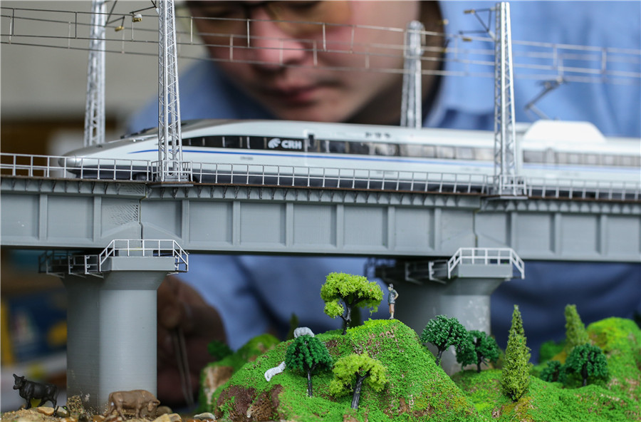 Railway conductor builds lifelike train models