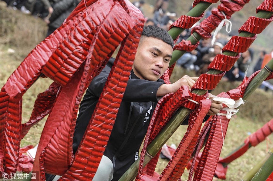 Miao people celebrate festival with millions of firecrackers