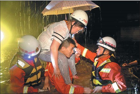 Emergency rescue teams called into action in flood-hit areas of Guizhou