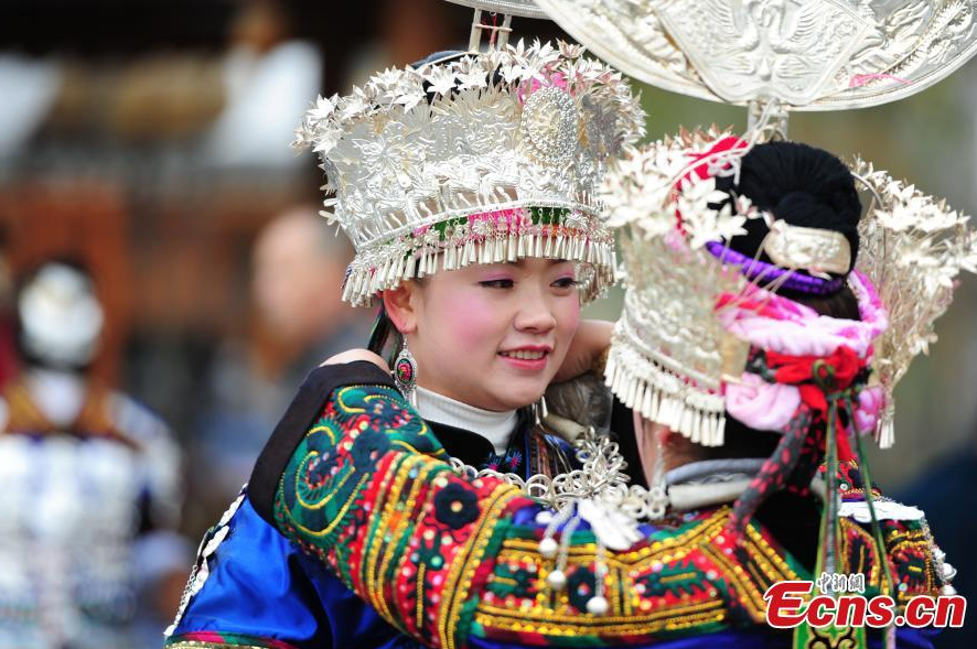 Married women of Miao ethnic group return home for New Year