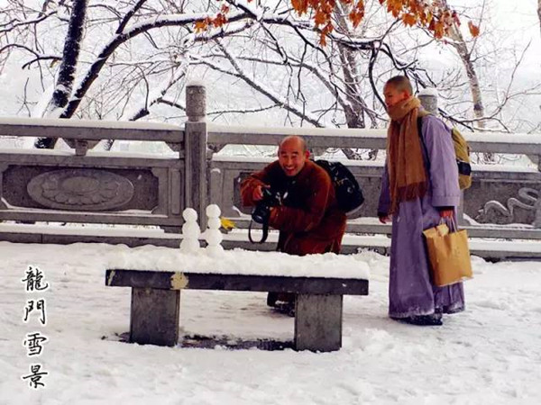 Snow makes Longmen Grottoes more beautiful